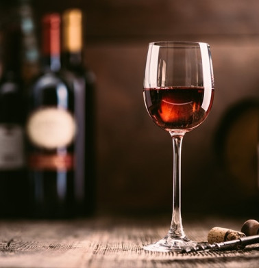 red wine glass and collection of excellent table wines